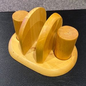 Wooden salt and pepper shakers with napkin holder